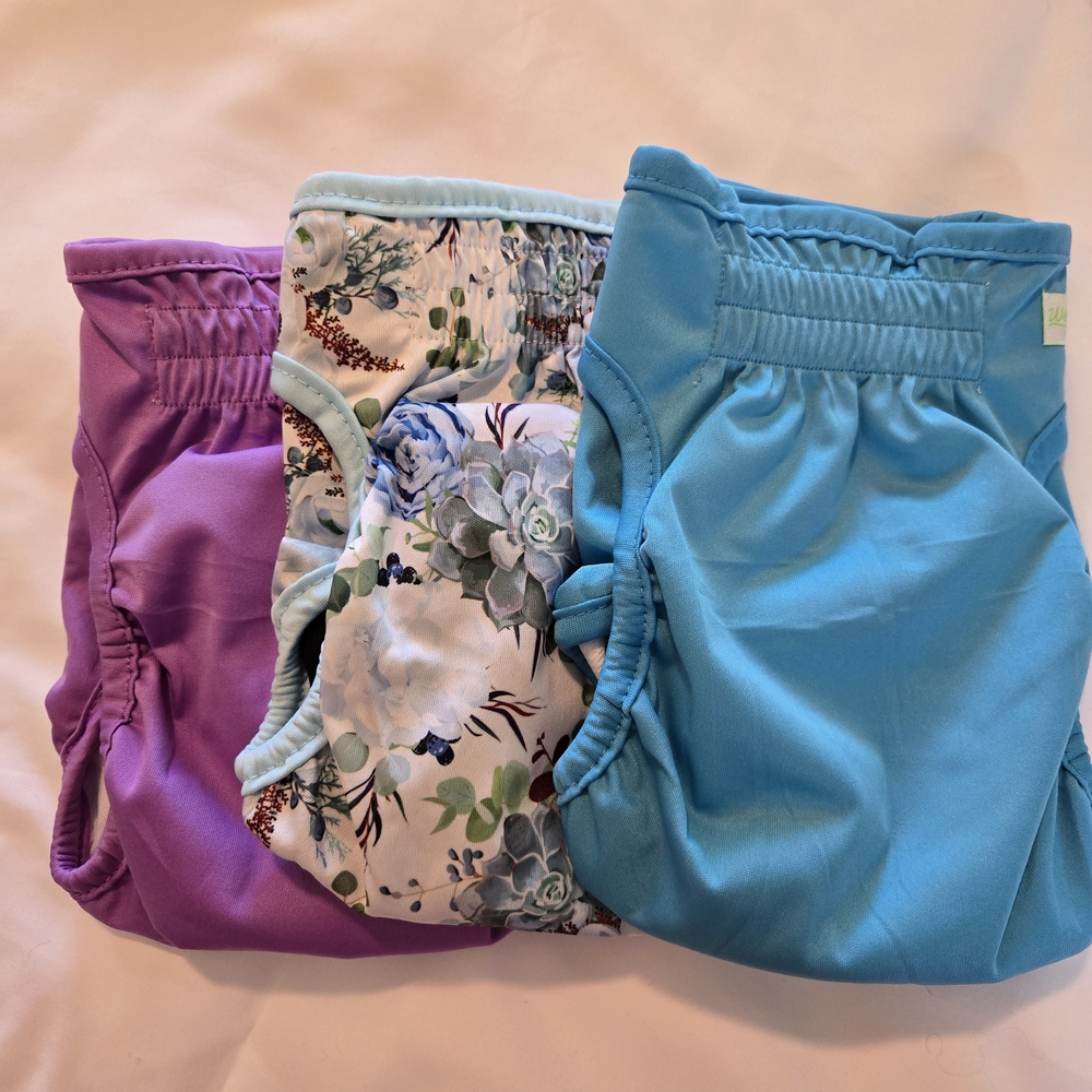 Set of Three Dog Diapers in Purple, Floral, and Blue 2 Med- 1 Sm That Runs Large